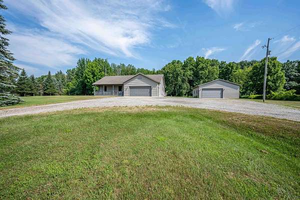 50 Acres of Recreational Land with Home for Sale in Coleman, Michigan