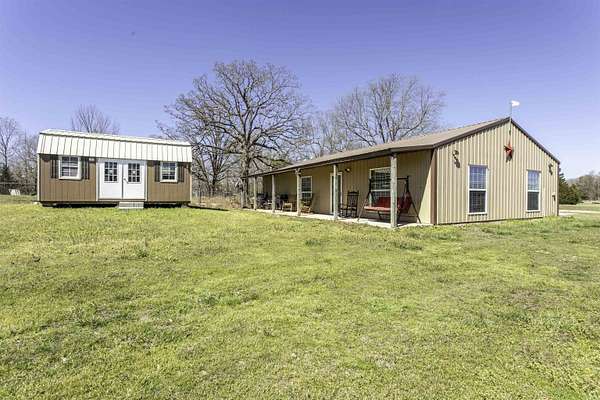 6.85 Acres of Land with Home for Sale in Highland, Arkansas