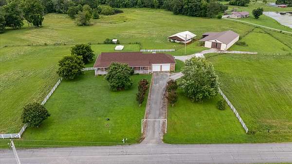 24 Acres of Agricultural Land with Home for Sale in Lawrenceburg, Tennessee