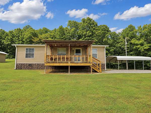 5.17 Acres of Land with Home for Sale in Riceville, Tennessee