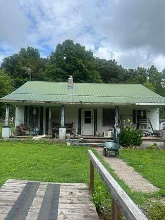 5.2 Acres of Land with Home for Sale in Athens, Tennessee