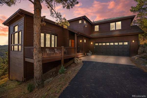 5 Acres of Land with Home for Sale in Evergreen, Colorado