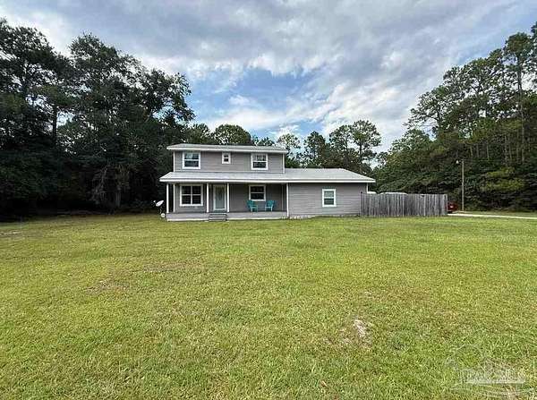 3.62 Acres of Land with Home for Sale in Milton, Florida
