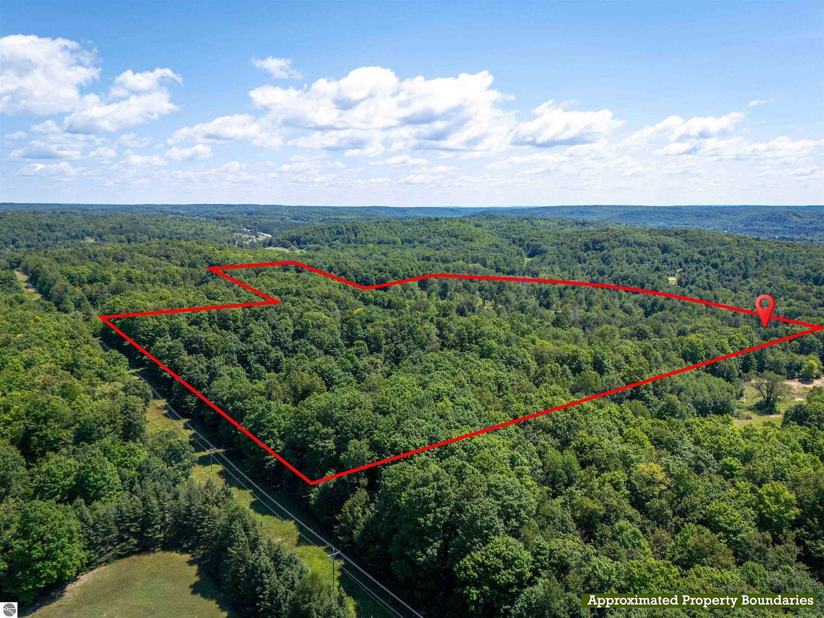 89 Acres of Land with Home for Sale in Rapid City, Michigan