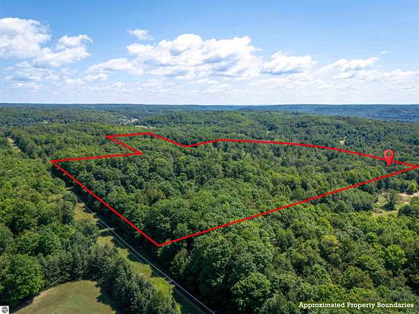 89 Acres of Land with Home for Sale in Rapid City, Michigan