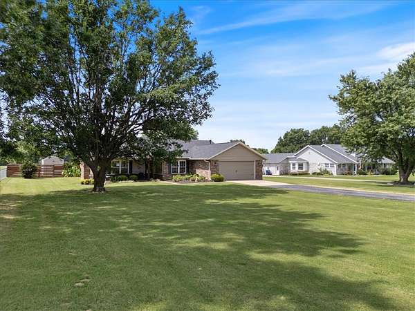 2.88 Acres of Land with Home for Sale in Elm Springs, Arkansas