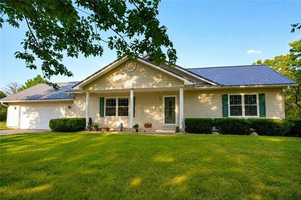 3.56 Acres of Land with Home for Sale in Rayville, Missouri