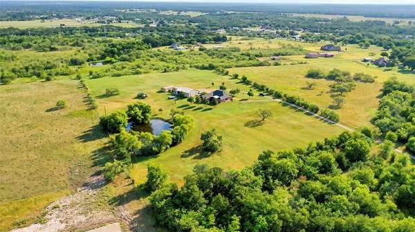 9.38 Acres of Land with Home for Sale in Royse City, Texas