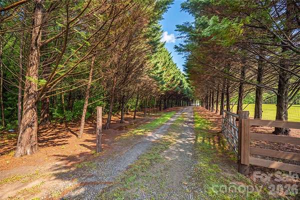 10.7 Acres of Land with Home for Sale in Alexis, North Carolina