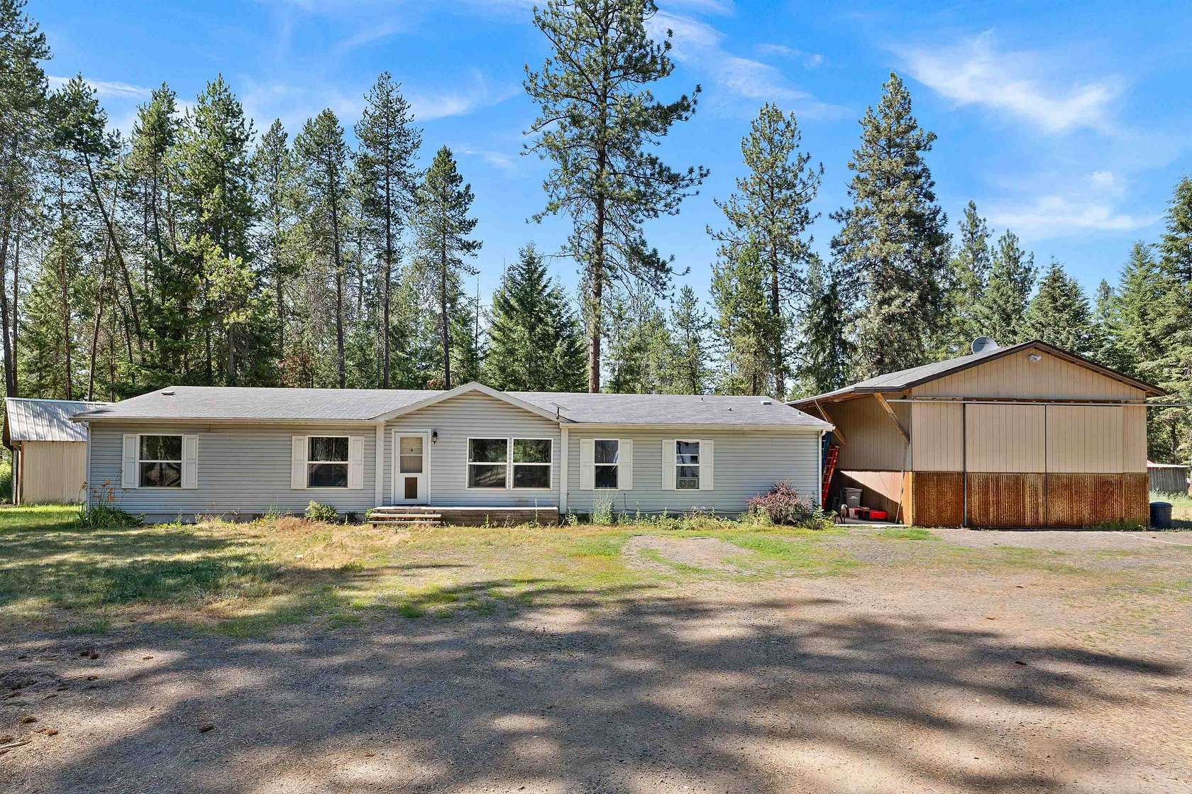 9.77 Acres of Land with Home for Sale in Chattaroy, Washington