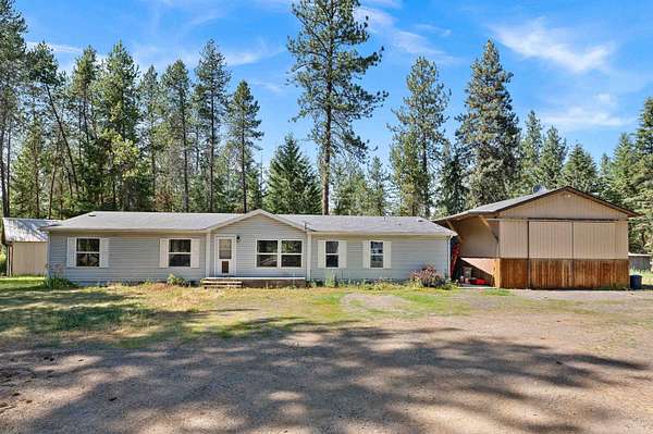 9.77 Acres of Land with Home for Sale in Chattaroy, Washington