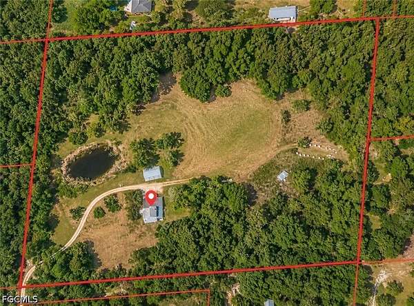 10.4 Acres of Land with Home for Sale in North Fort Myers, Florida