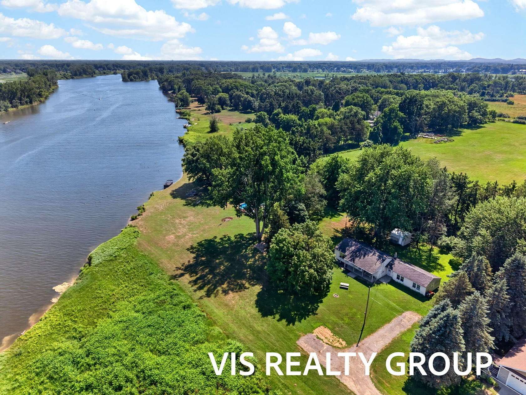 3.35 Acres of Land with Home for Sale in Spring Lake, Michigan