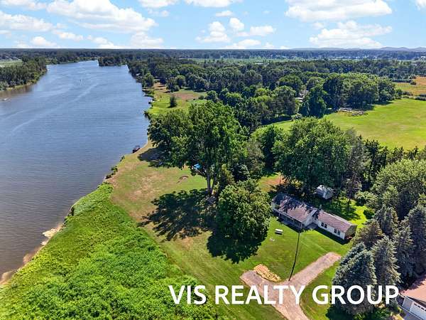 3.35 Acres of Land with Home for Sale in Spring Lake, Michigan