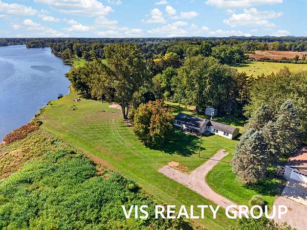 3.35 Acres of Land with Home for Sale in Spring Lake, Michigan