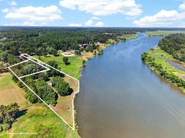 4 Acres of Land with Home for Sale in Spring Lake, Michigan