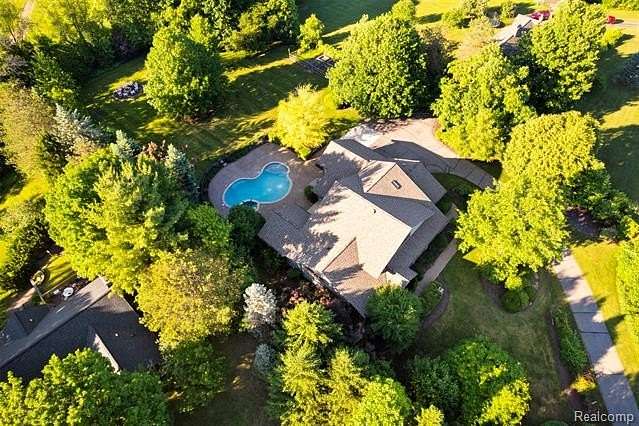 2 Acres of Land with Home for Sale in Salem Township, Michigan