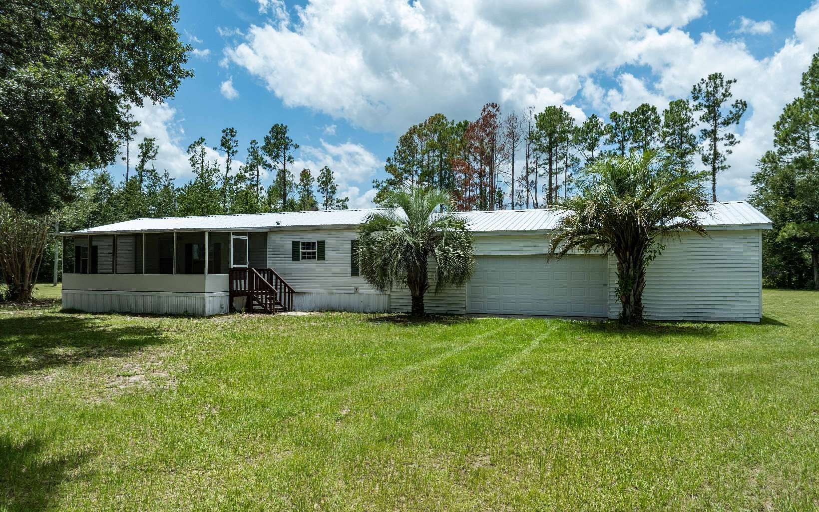 2.59 Acres of Land with Home for Sale in McAlpin, Florida