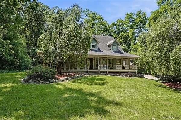 4.7 Acres of Land with Home for Sale in Tyrone Township, Michigan