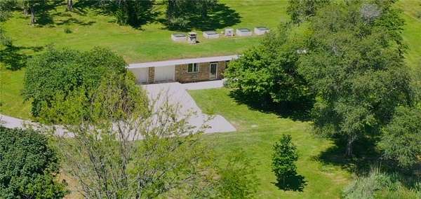 5 Acres of Land with Home for Sale in Oak Grove, Missouri