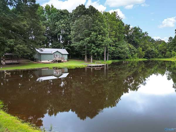 9.5 Acres of Land with Home for Sale in Boaz, Alabama