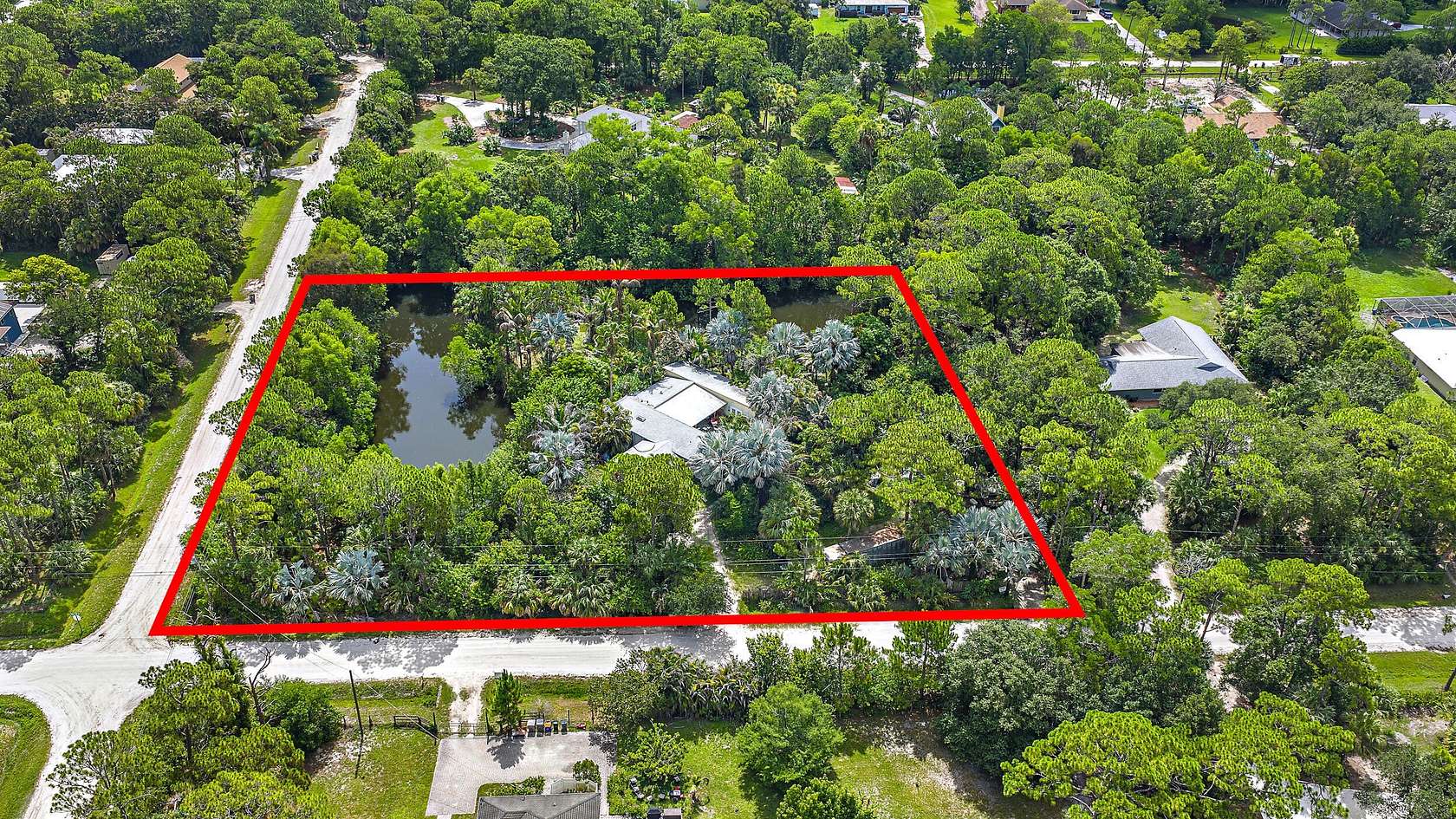 2.5 Acres of Land with Home for Sale in Jupiter, Florida