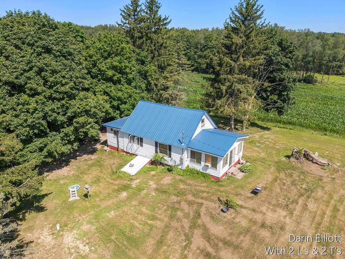 1.5 Acres of Land with Home for Sale in Edmore, Michigan