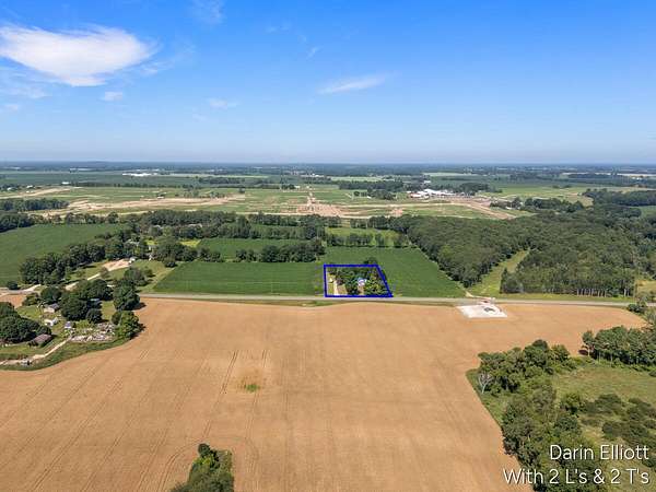 1.5 Acres of Land with Home for Sale in Edmore, Michigan