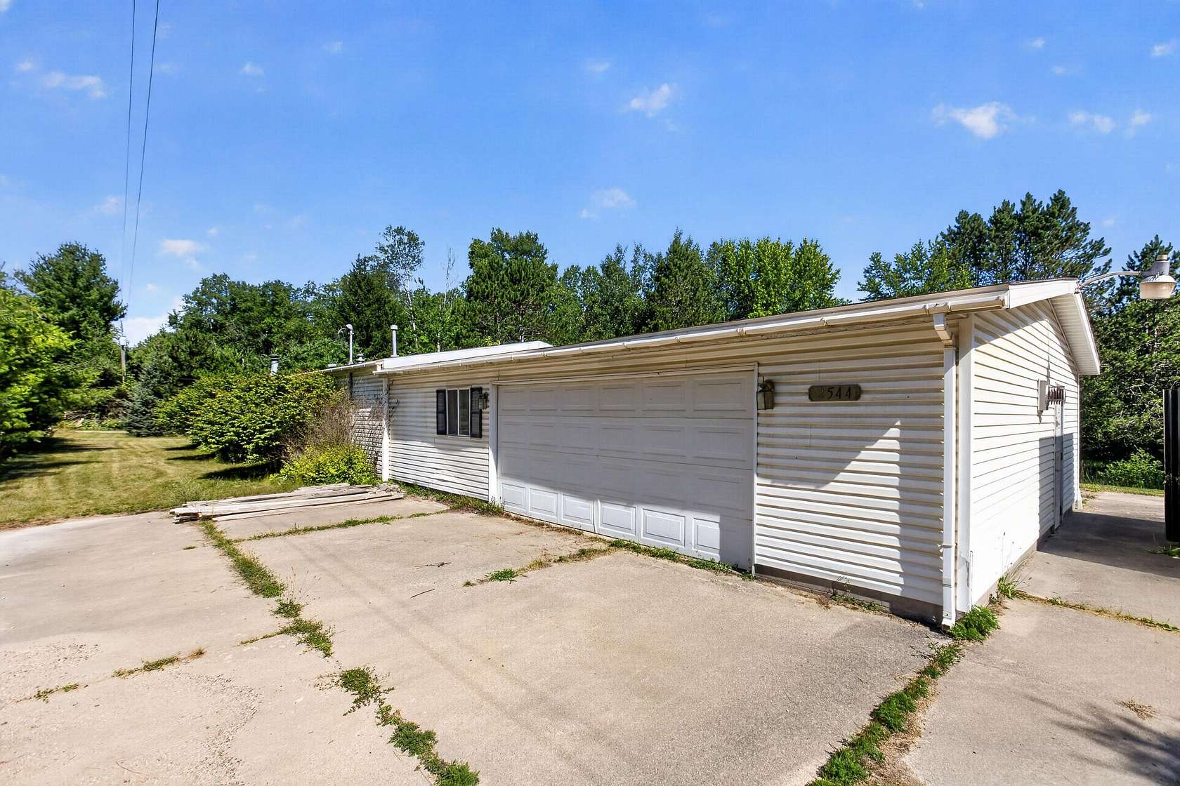 10.3 Acres of Recreational Land with Home for Sale in Sears, Michigan