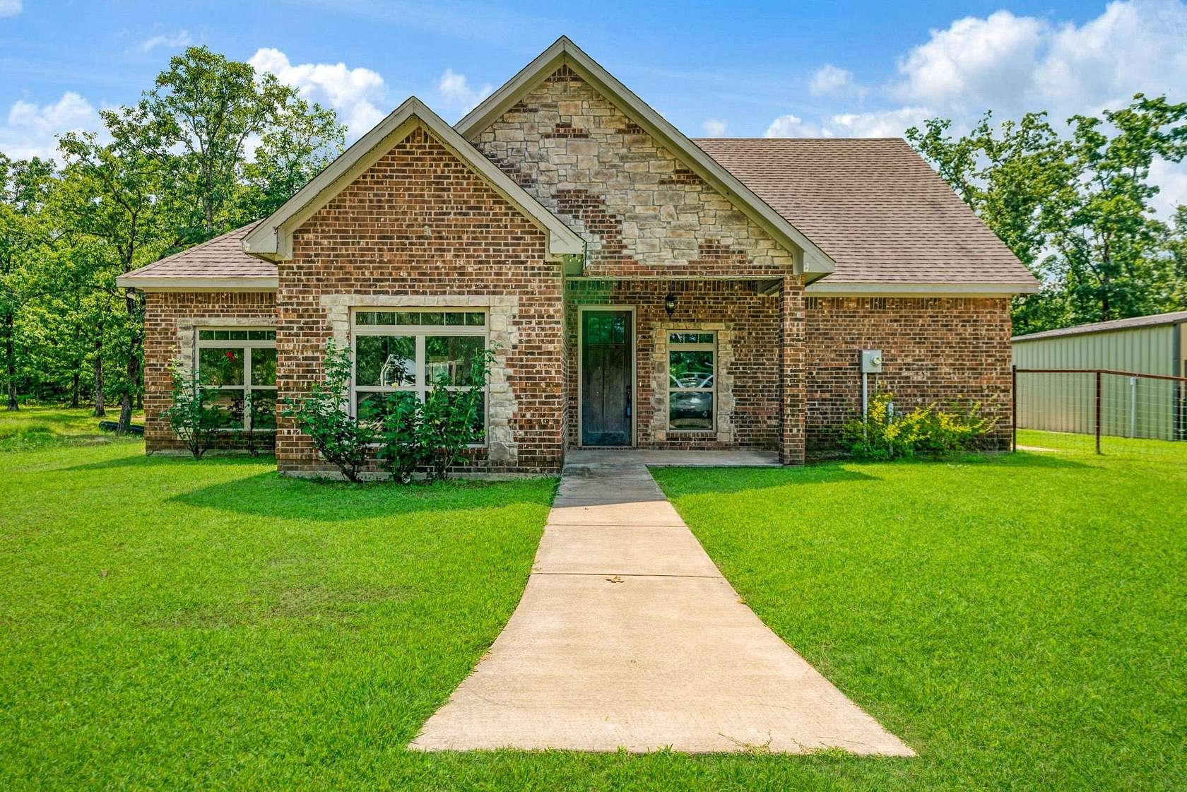 11.4 Acres of Land with Home for Sale in Paris, Texas