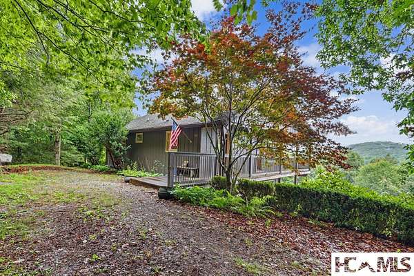 2.79 Acres of Land with Home for Sale in Scaly Mountain, North Carolina