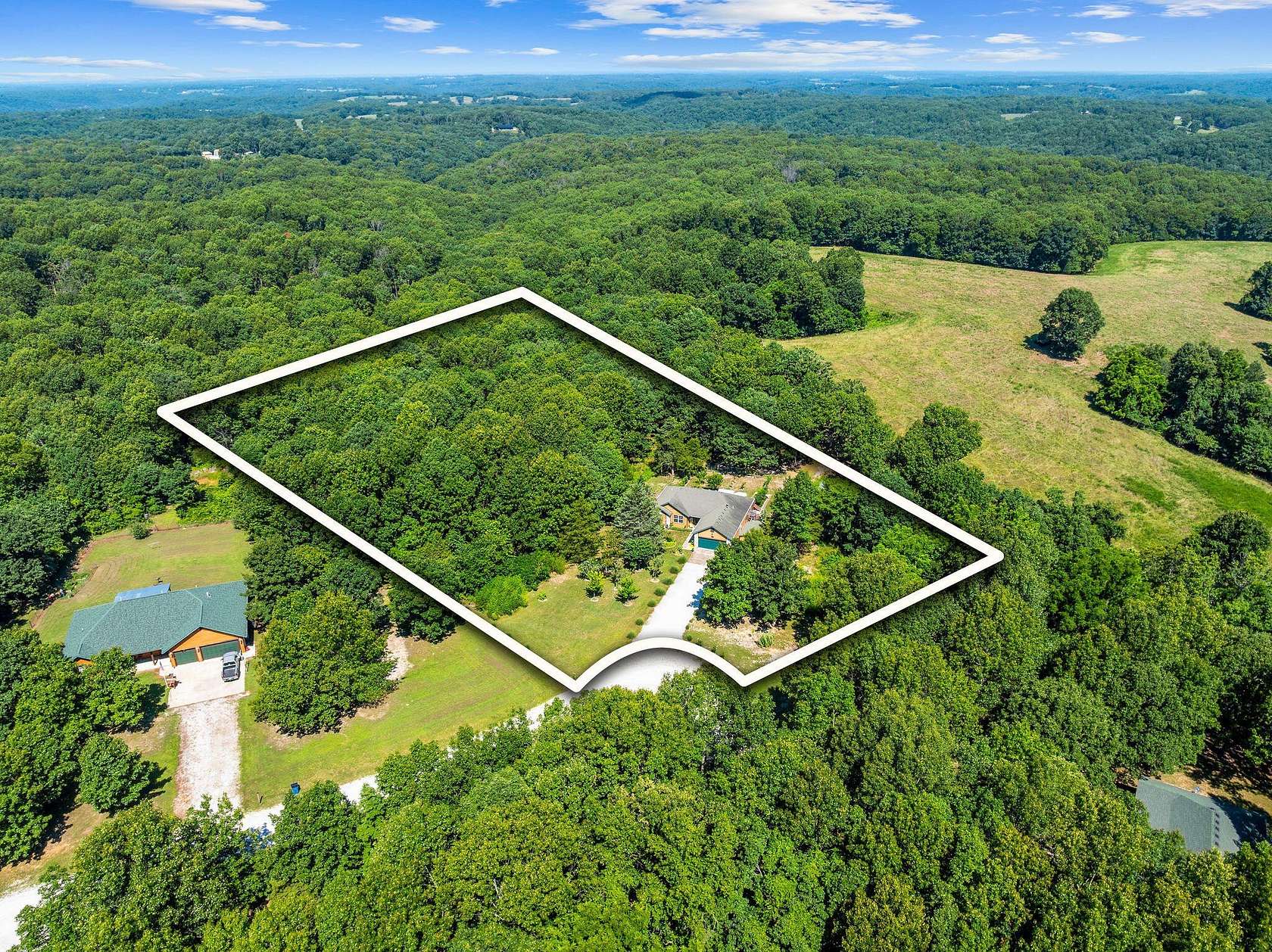 3.77 Acres of Land with Home for Sale in Galena, Missouri