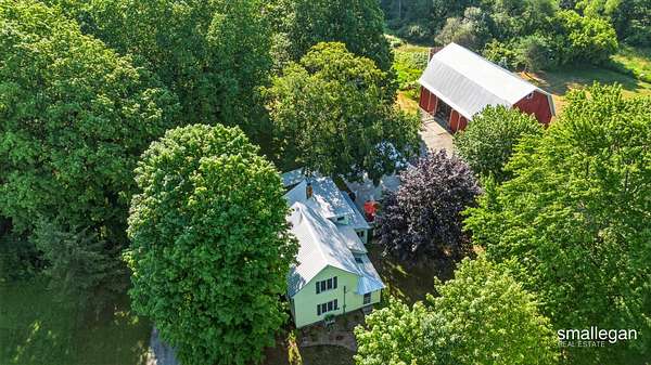 4 Acres of Land with Home for Sale in Cedar Springs, Michigan