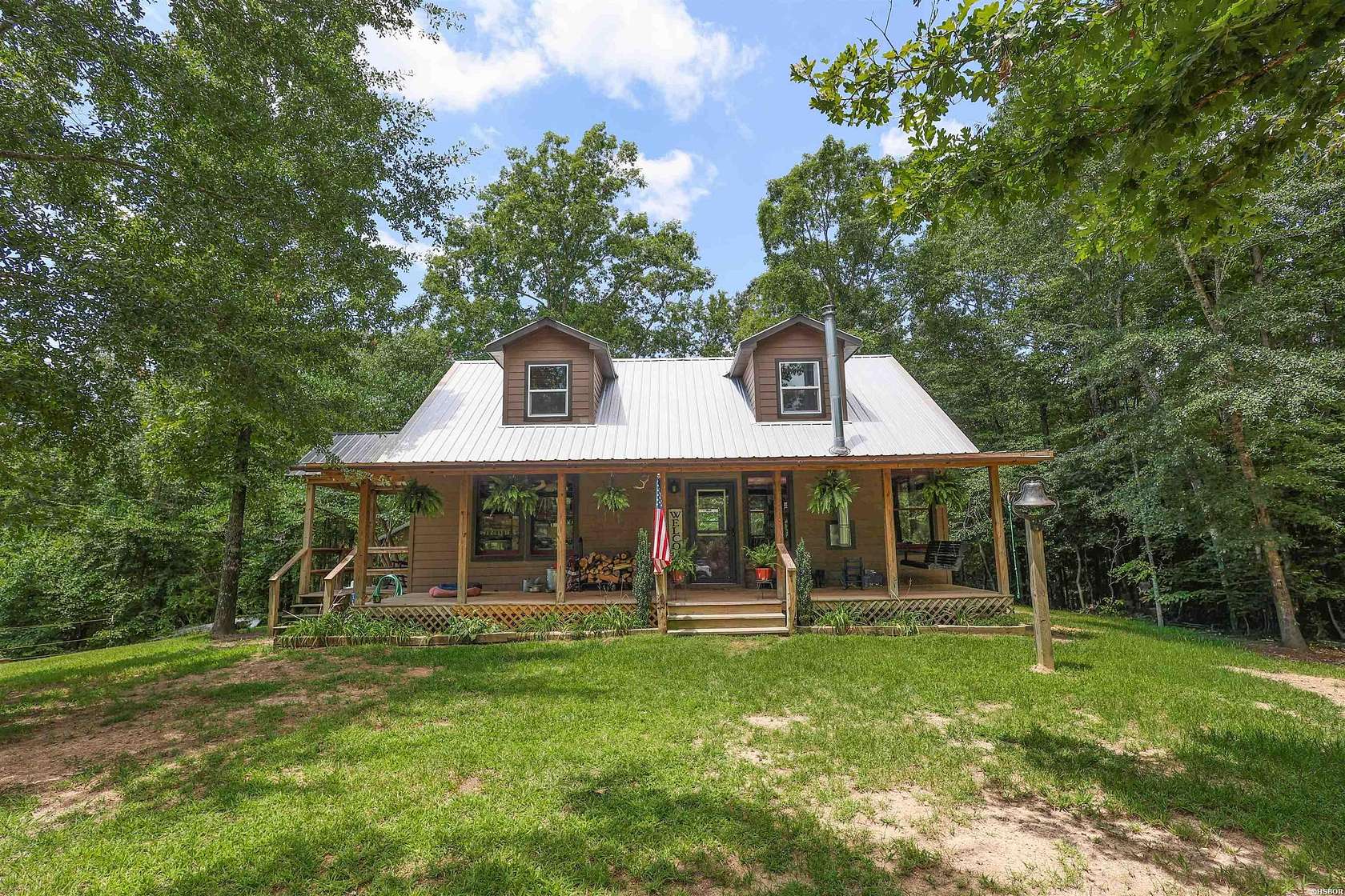 11.7 Acres of Land with Home for Sale in Caddo Gap, Arkansas