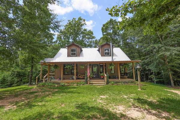11.7 Acres of Land with Home for Sale in Caddo Gap, Arkansas