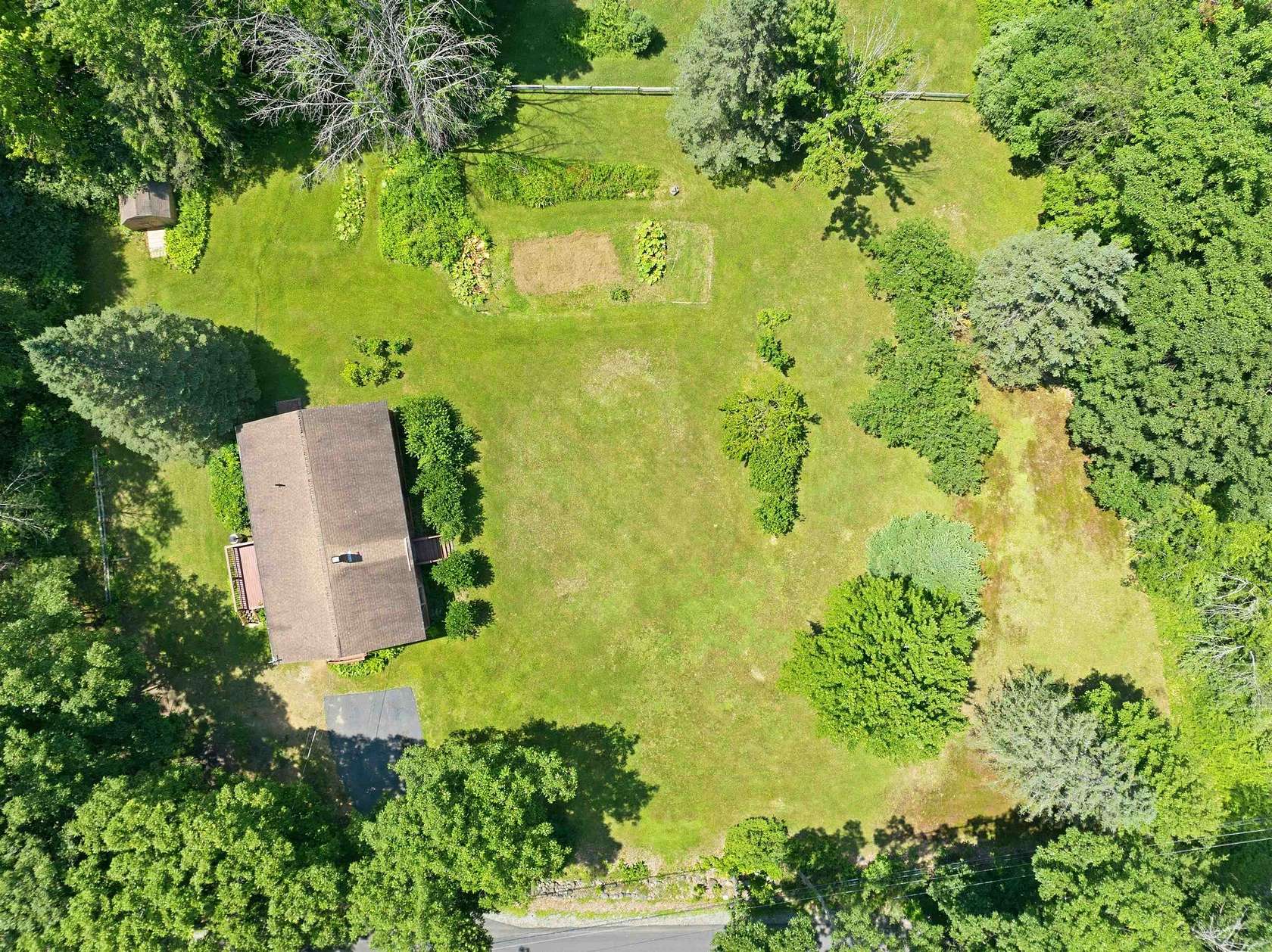 1.84 Acres of Land with Home for Sale in Belmont, New Hampshire