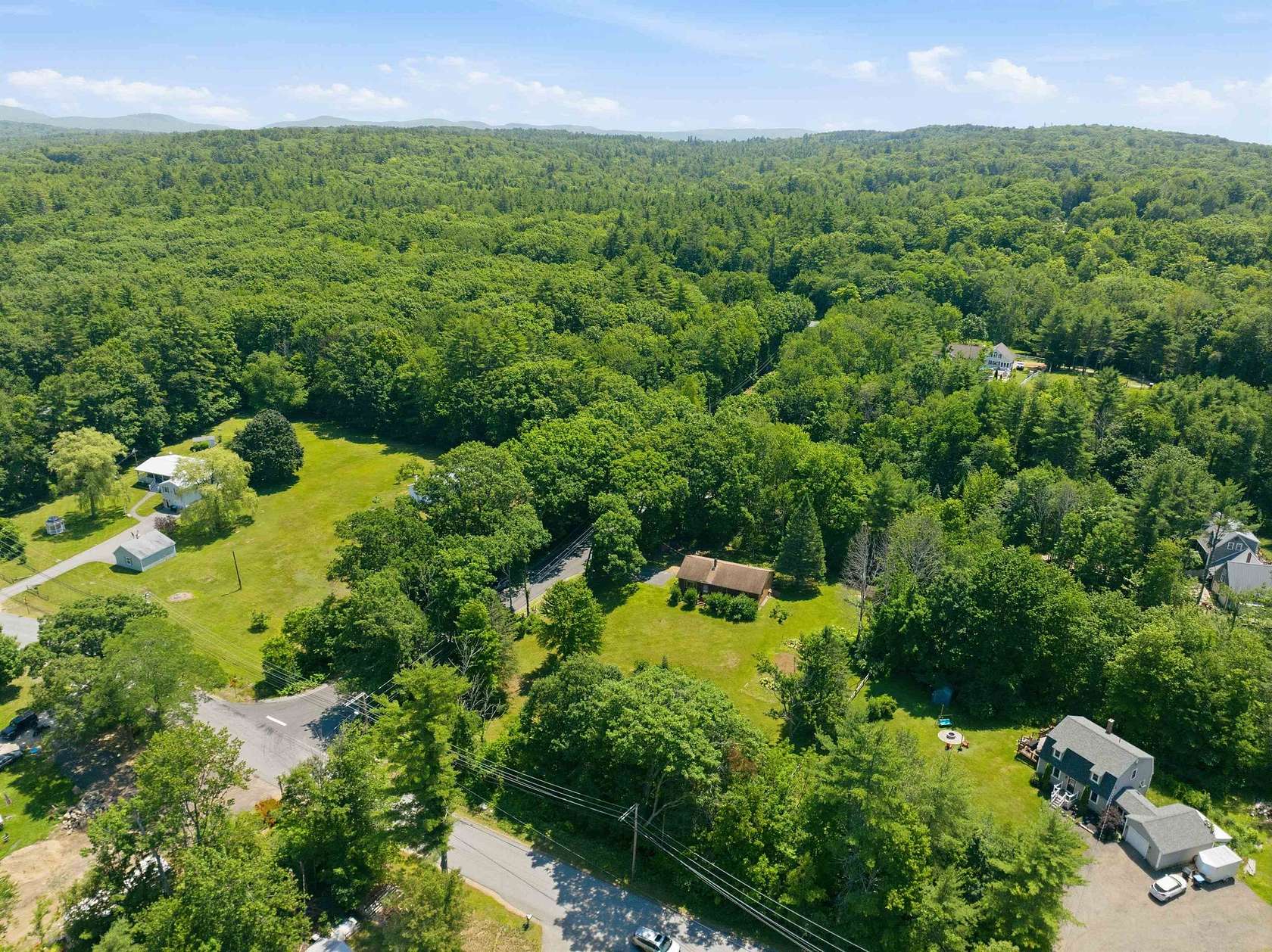 1.84 Acres of Land with Home for Sale in Belmont, New Hampshire