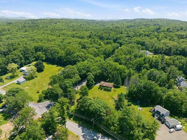 1.84 Acres of Land with Home for Sale in Belmont, New Hampshire