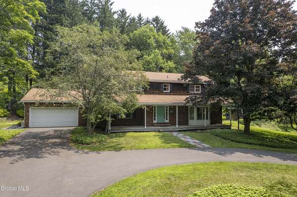 2.87 Acres of Land with Home for Sale in West Sand Lake, New York