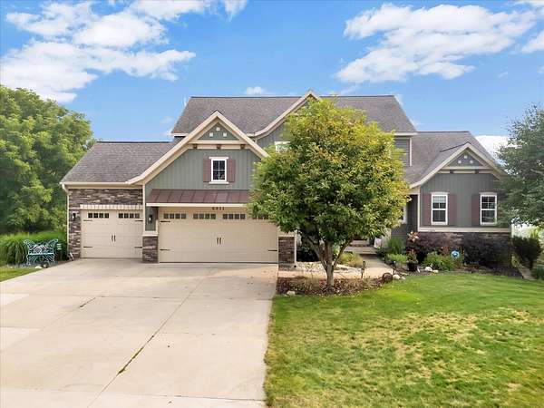 1.73 Acres of Land with Home for Sale in Rockford, Michigan