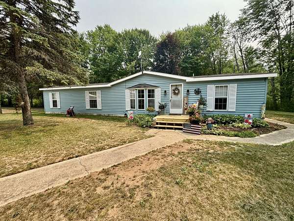 13.5 Acres of Land with Home for Sale in Paris, Michigan