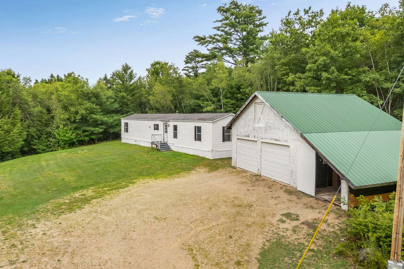 2 Acres of Land with Home for Sale in Wales Town, Maine