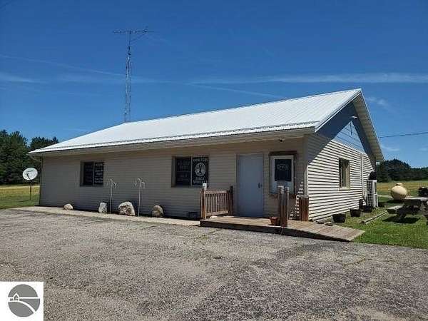 2.4 Acres of Improved Commercial Land for Sale in Alger, Michigan