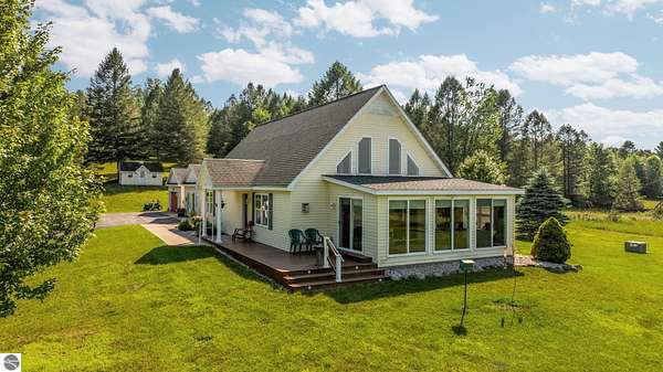 12.3 Acres of Land with Home for Sale in Bellaire, Michigan