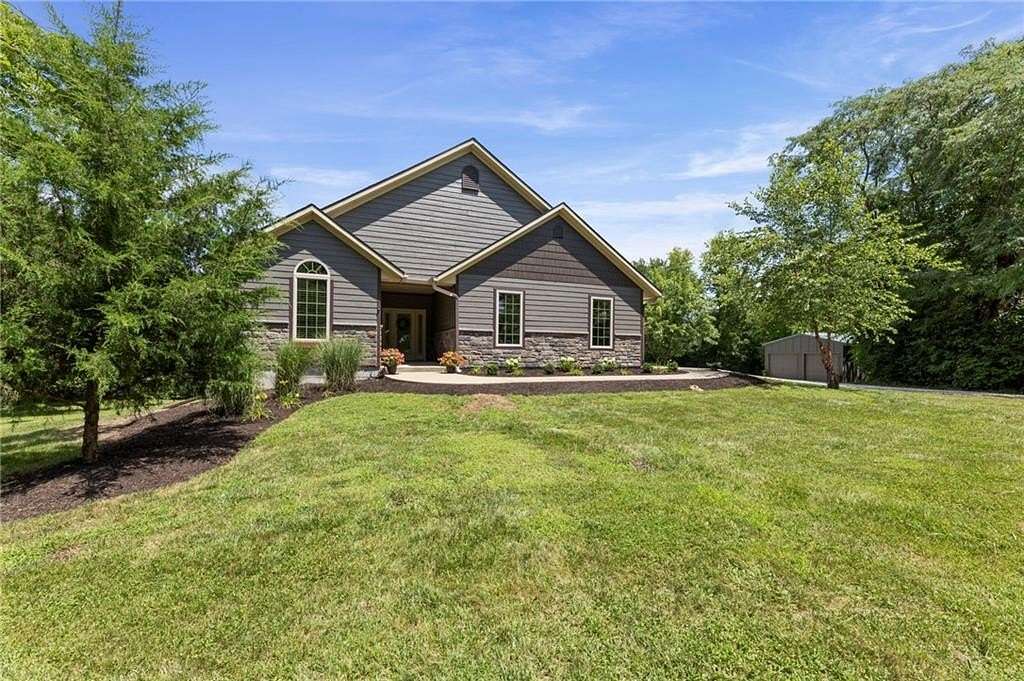 4.9 Acres of Land with Home for Sale in Belton, Missouri
