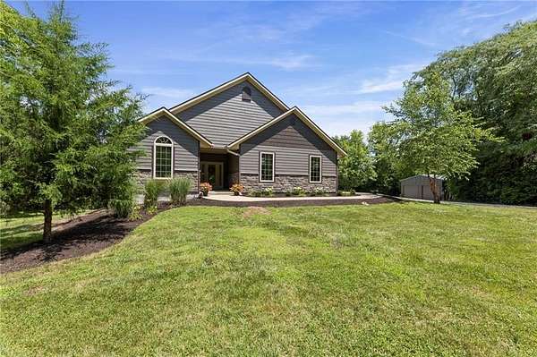 4.9 Acres of Land with Home for Sale in Belton, Missouri