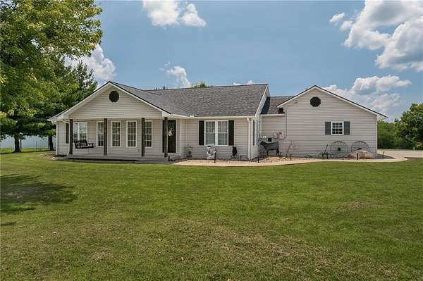 10.7 Acres of Land with Home for Sale in Agency, Missouri
