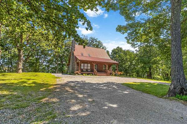 12.1 Acres of Land with Home for Sale in Junction City, Kentucky