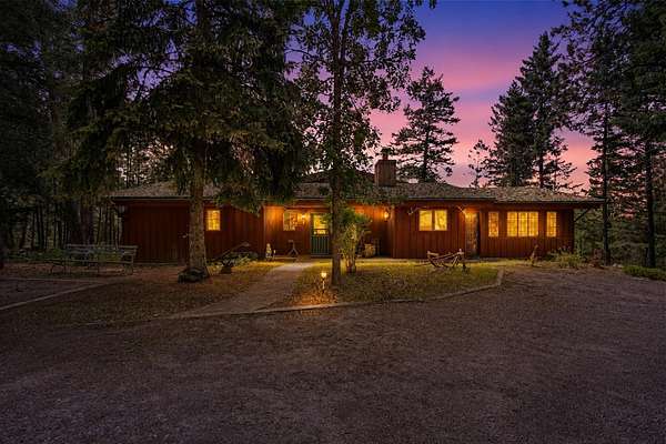 7.36 Acres of Land with Home for Sale in Bigfork, Montana