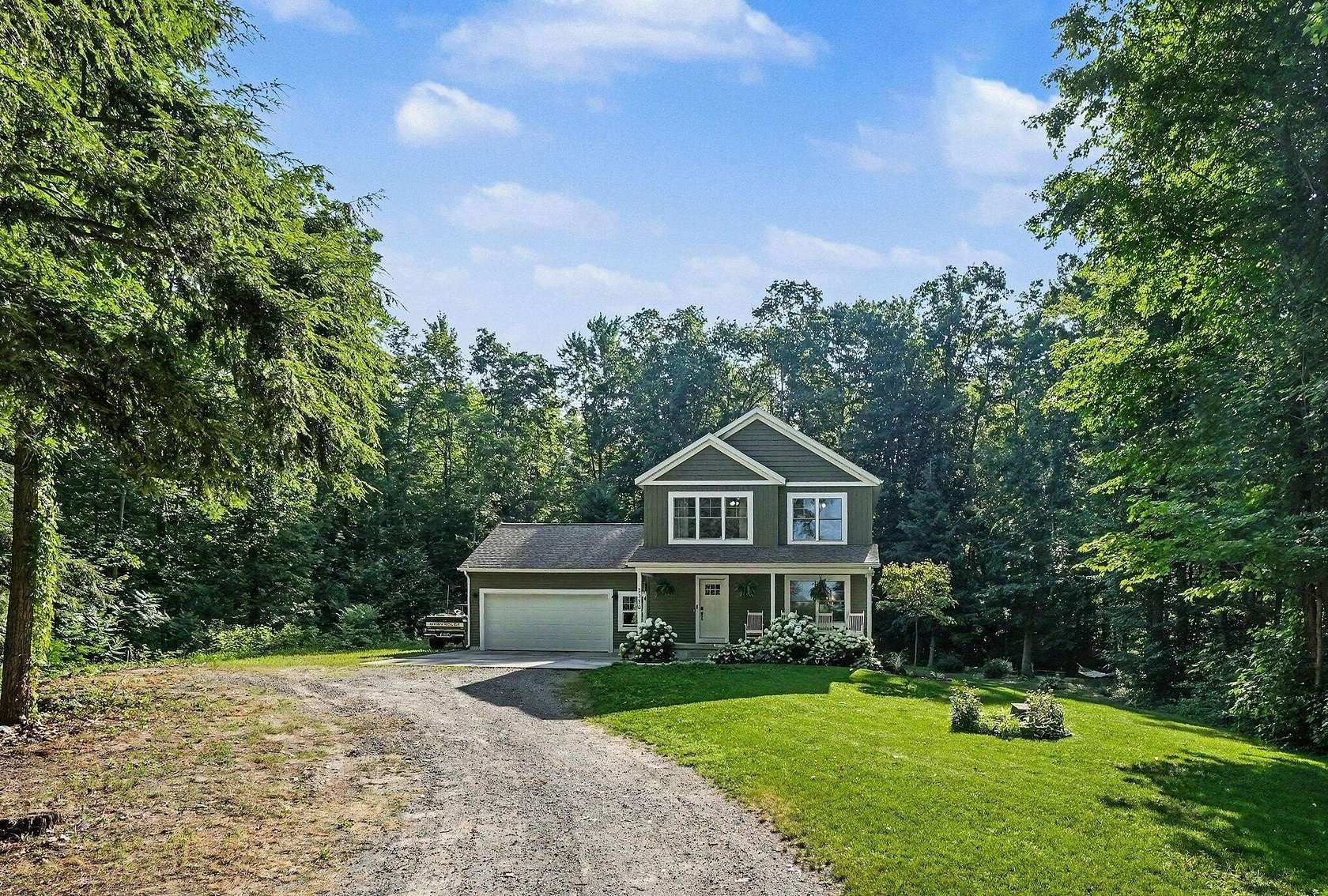 5 Acres of Land with Home for Sale in Ravenna, Michigan